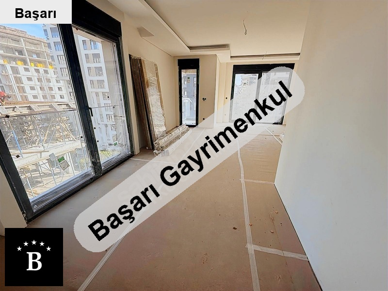 Başarı'dan suadi̇yede balkonlu oturuma hazir sifir bi̇nada 2+1 dai̇re