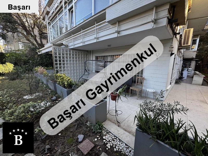 Başarı'dan kalamiş sahi̇lde 2+1 95 m2 bahçe kullanimli ferah dai̇re