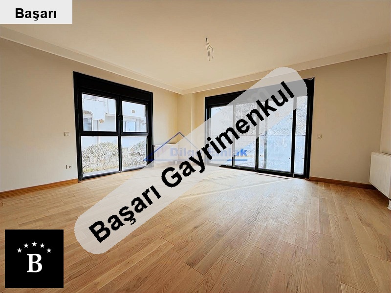 Başarı'dan  sahilde 3+1 85 m2 net kısmi deniz manzsatılık daire