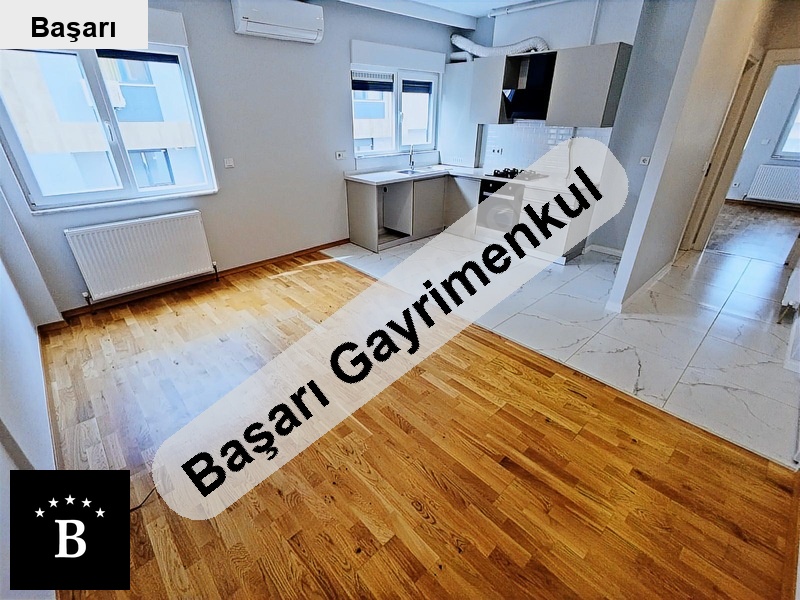 Başarı'dan  sahilde göztepe parkına yakın yeni binada 1+1 daire