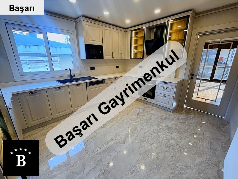 Başarı'dan katta tek 4+1 / salon 52 m² / mutfak 15 m² / 3 banyolu / göztepe