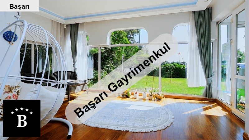 Başarı'dan  sahi̇lde hari̇ka konumda satilik bahçe dubleksi̇ dai̇re