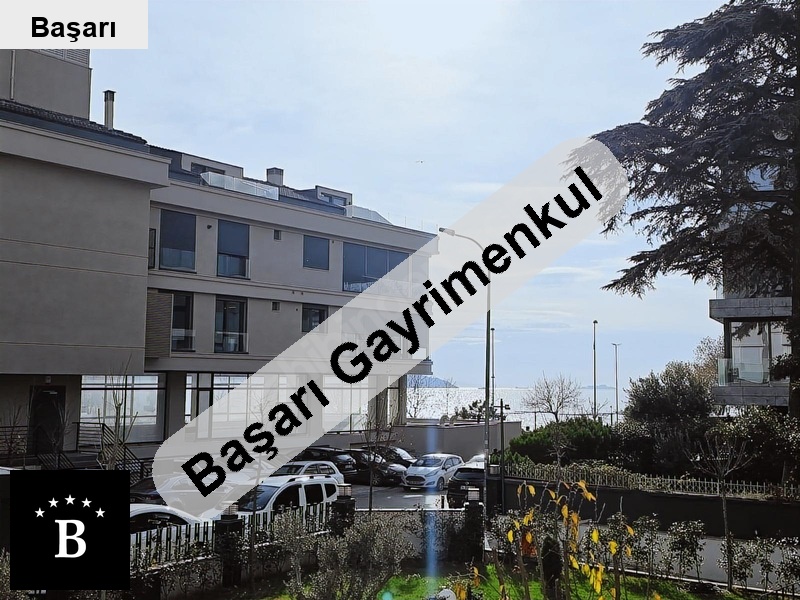 Başarı'dan sahi̇lde  buti̇k bi̇na